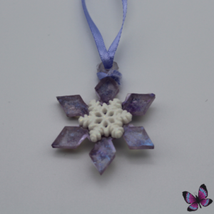 Small purple with white centre snowflake