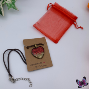 Red and gold glitter heart